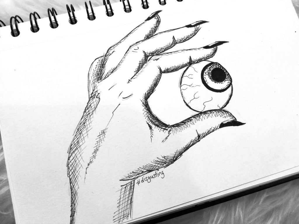 Auge in Hand