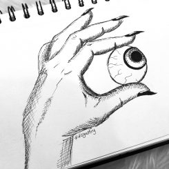 Auge in Hand